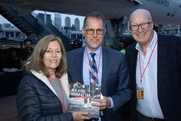 Manhattan Borough President Mark Levlne (center) with Betsy Bober Polivy and Phil O’Brien at the W42ST Best of Awards 2022 at Intrepid Museum.  undefined undefined