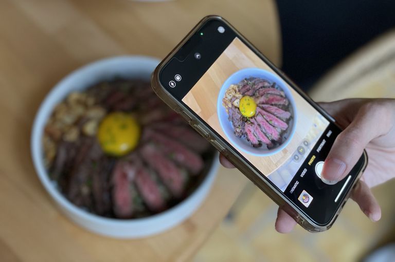 Lum Lum dish and phone Thai Midtown West Hells Kitchen