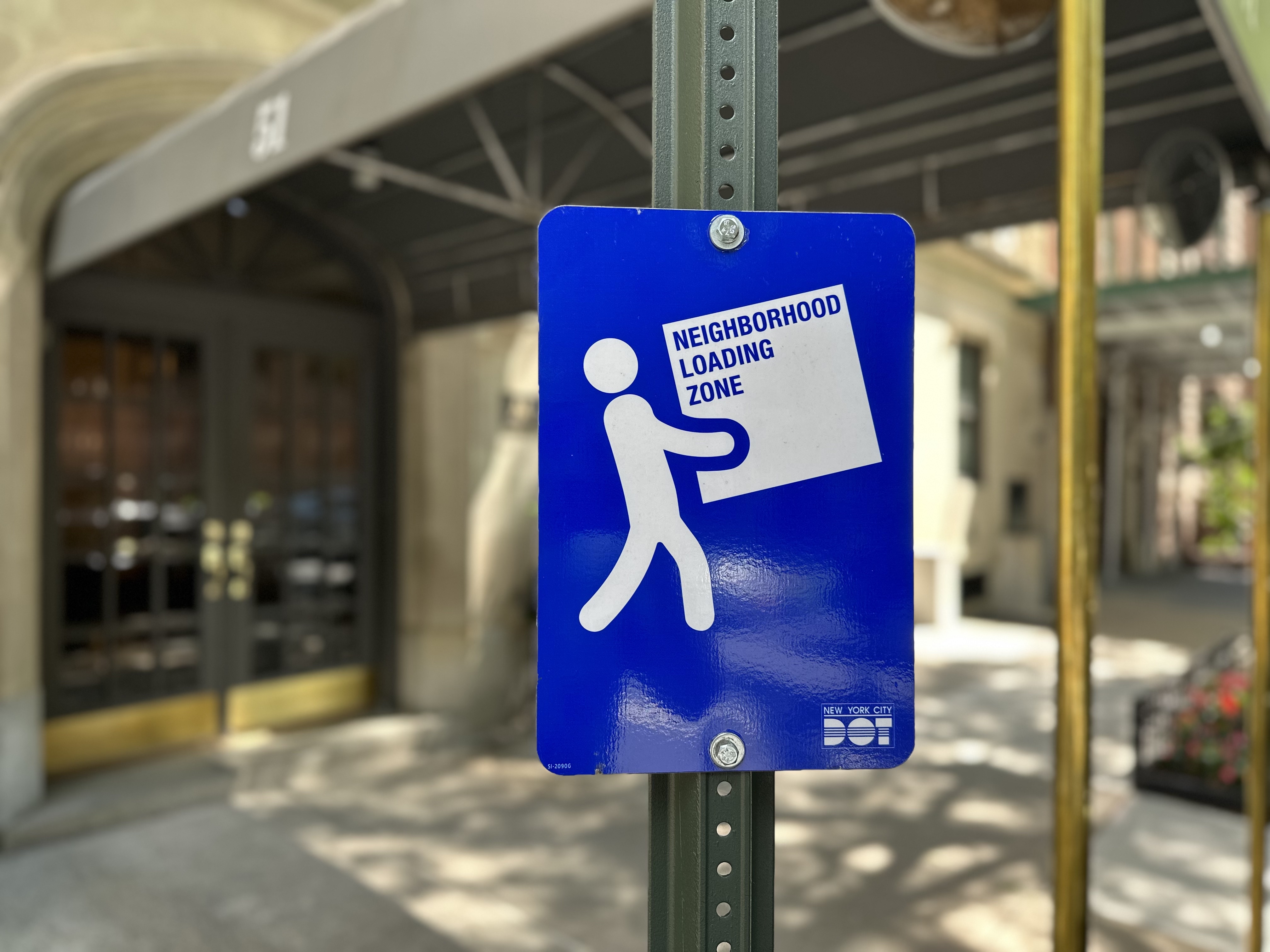 Neighborhood Loading Zone sign on E90th Street.