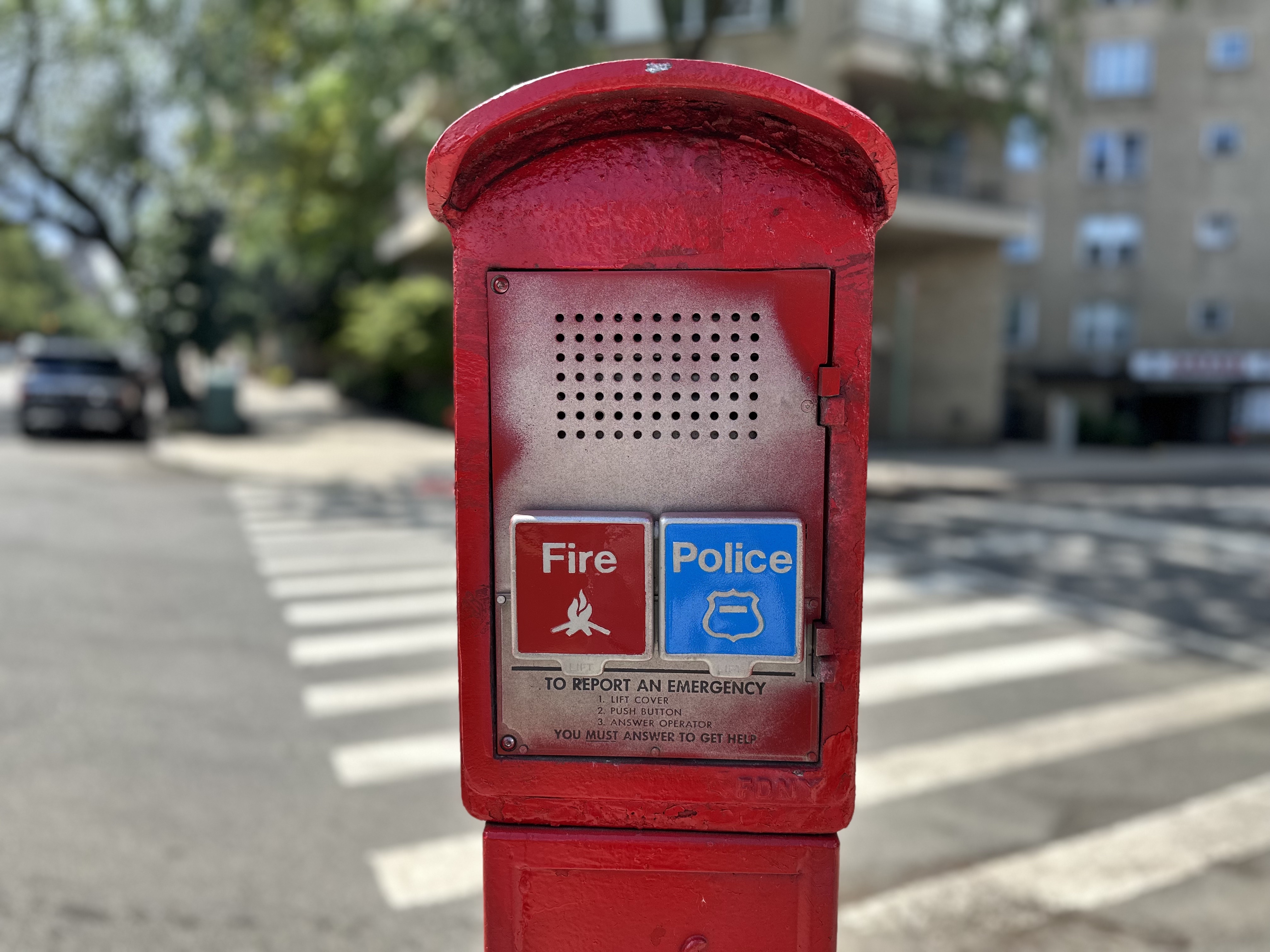 Long obsolete call boxes — but the Fire and Police symbols are clear.